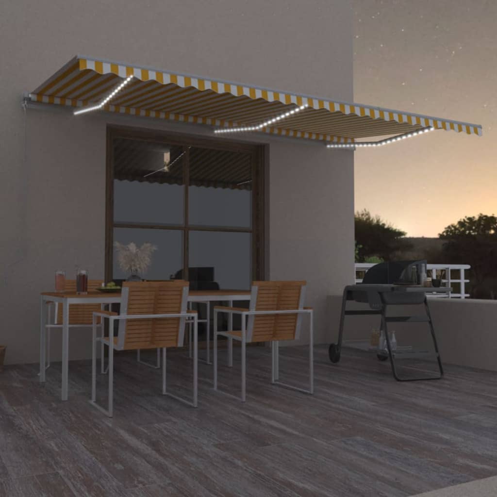 vidaXL Ręcznie zwijana markiza z LED, 600x350 cm, żółto-biała