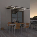 vidaXL Ręcznie zwijana markiza z LED, 350 x 250 cm, kremowa