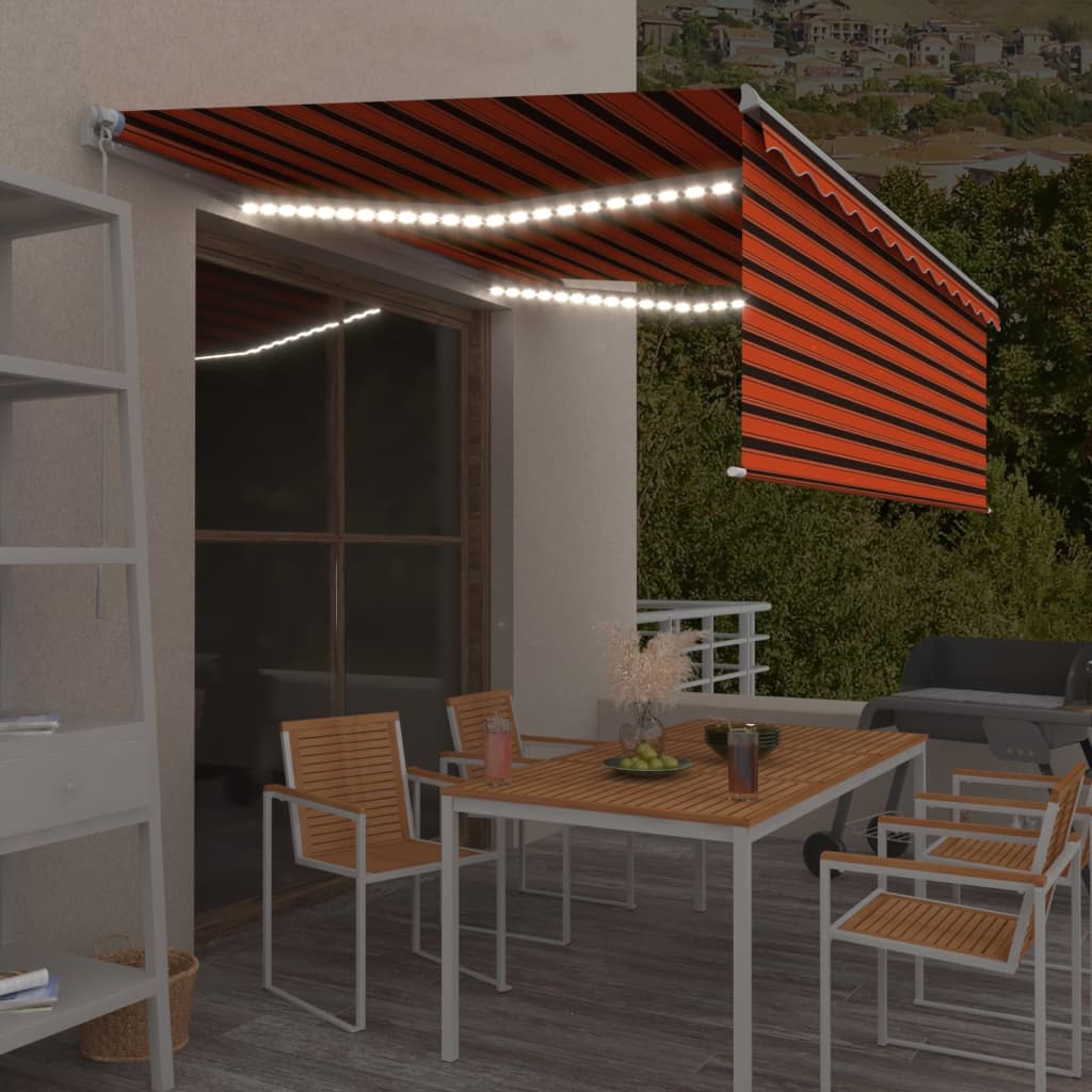 vidaXL Ręcznie zwijana markiza z LED, 4,5x3 m, pomarańczowo-brązowa