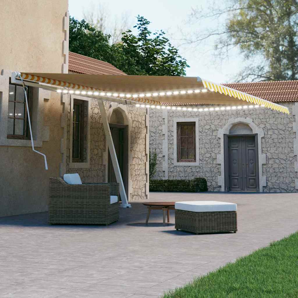 vidaXL Ręcznie zwijana markiza z LED, 600 x 300 cm, żółto-biała