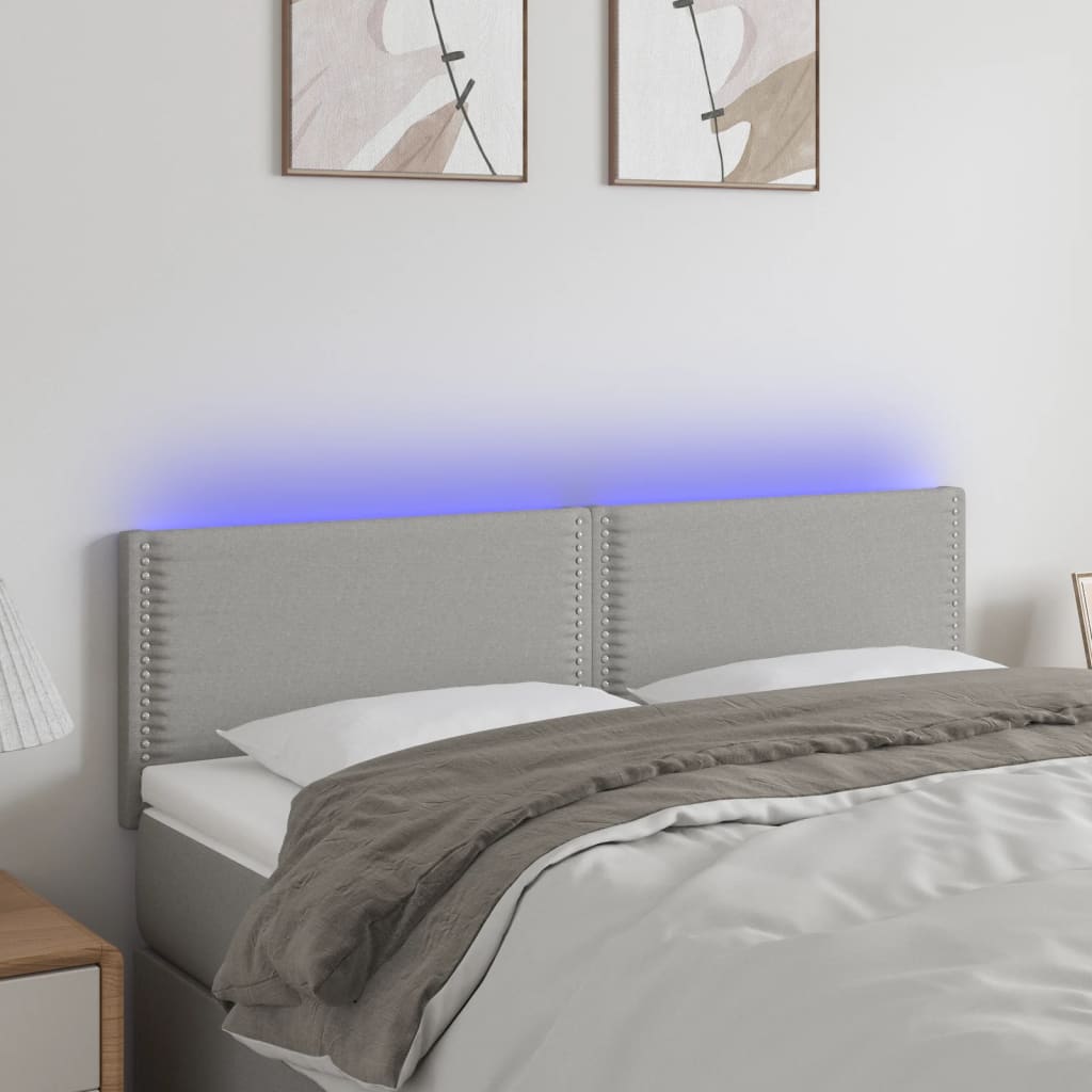 vidaXL Zagłówek do łóżka z LED, jasnoszary, 144x5x78/88 cm, tkanina