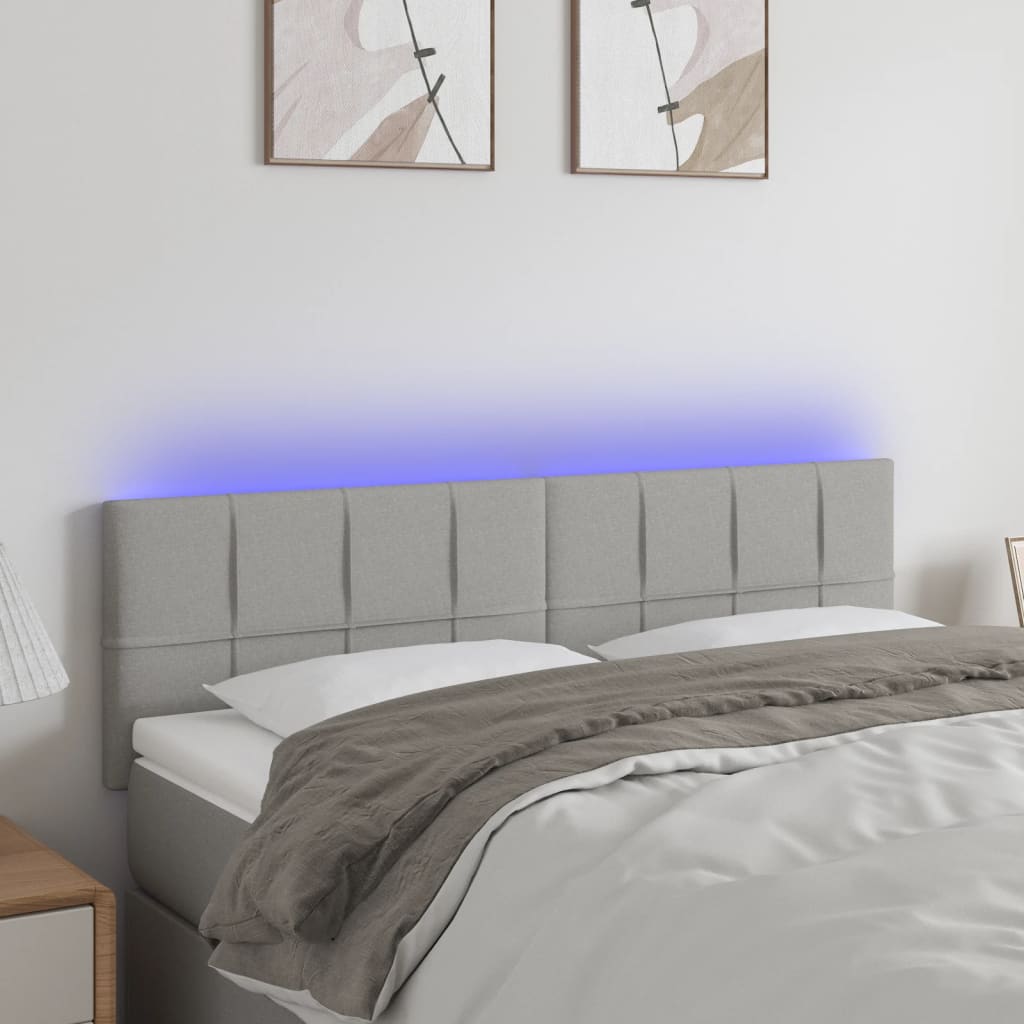 vidaXL Zagłówek do łóżka z LED, jasnoszary, 144x5x78/88 cm, tkanina