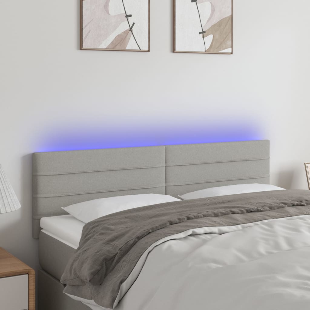vidaXL Zagłówek do łóżka z LED, jasnoszary, 144x5x78/88 cm, tkanina