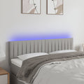 vidaXL Zagłówek do łóżka z LED, jasnoszary, 144x5x78/88 cm, tkanina