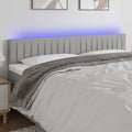vidaXL Zagłówek do łóżka z LED, jasnoszary, 200x5x78/88 cm, tkanina