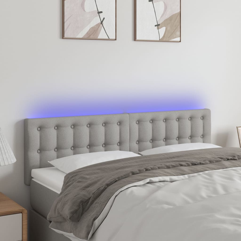 vidaXL Zagłówek do łóżka z LED, jasnoszary, 144x5x78/88 cm, tkanina