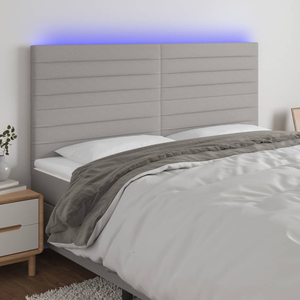 vidaXL Zagłówek do łóżka z LED, jasnoszary, 160x5x118/128 cm, tkanina