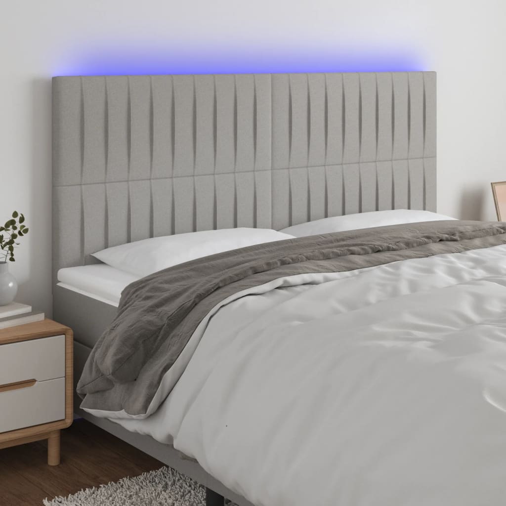 vidaXL Zagłówek do łóżka z LED, jasnoszary, 200x5x118/128 cm, tkanina