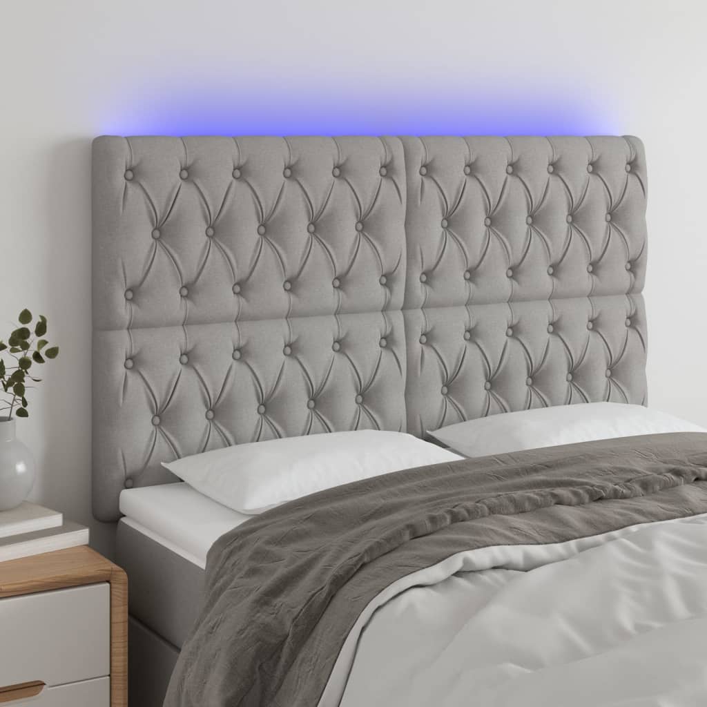 vidaXL Zagłówek do łóżka z LED, jasnoszary, 160x7x118/128 cm, tkanina
