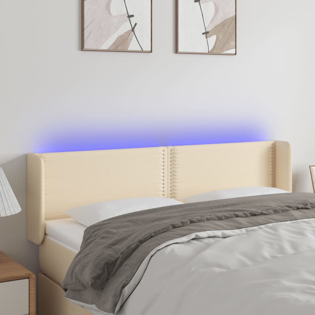 vidaXL Zagłówek do łóżka z LED, kremowy, 147x16x78/88 cm, tkanina
