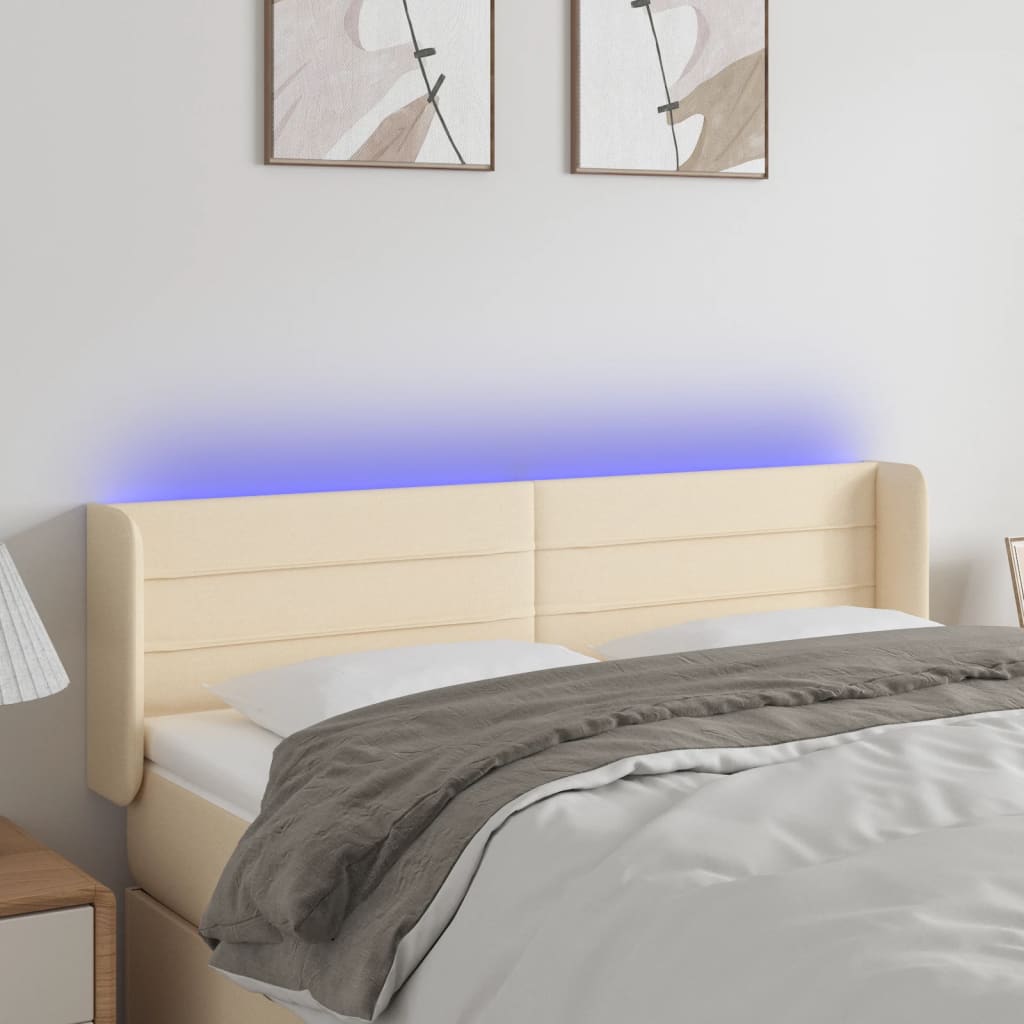 vidaXL Zagłówek do łóżka z LED, kremowy, 147x16x78/88 cm, tkanina