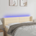 vidaXL Zagłówek do łóżka z LED, kremowy, 147x16x78/88 cm, tkanina