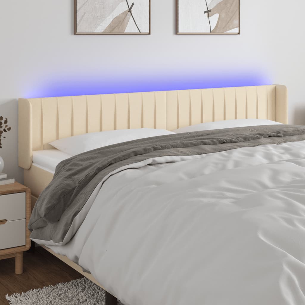 vidaXL Zagłówek do łóżka z LED, kremowy, 203x16x78/88 cm, tkanina