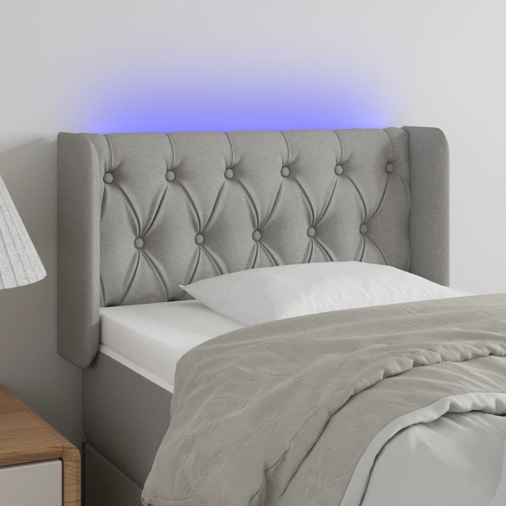 vidaXL Zagłówek do łóżka z LED, jasnoszary, 83x16x78/88 cm, tkanina