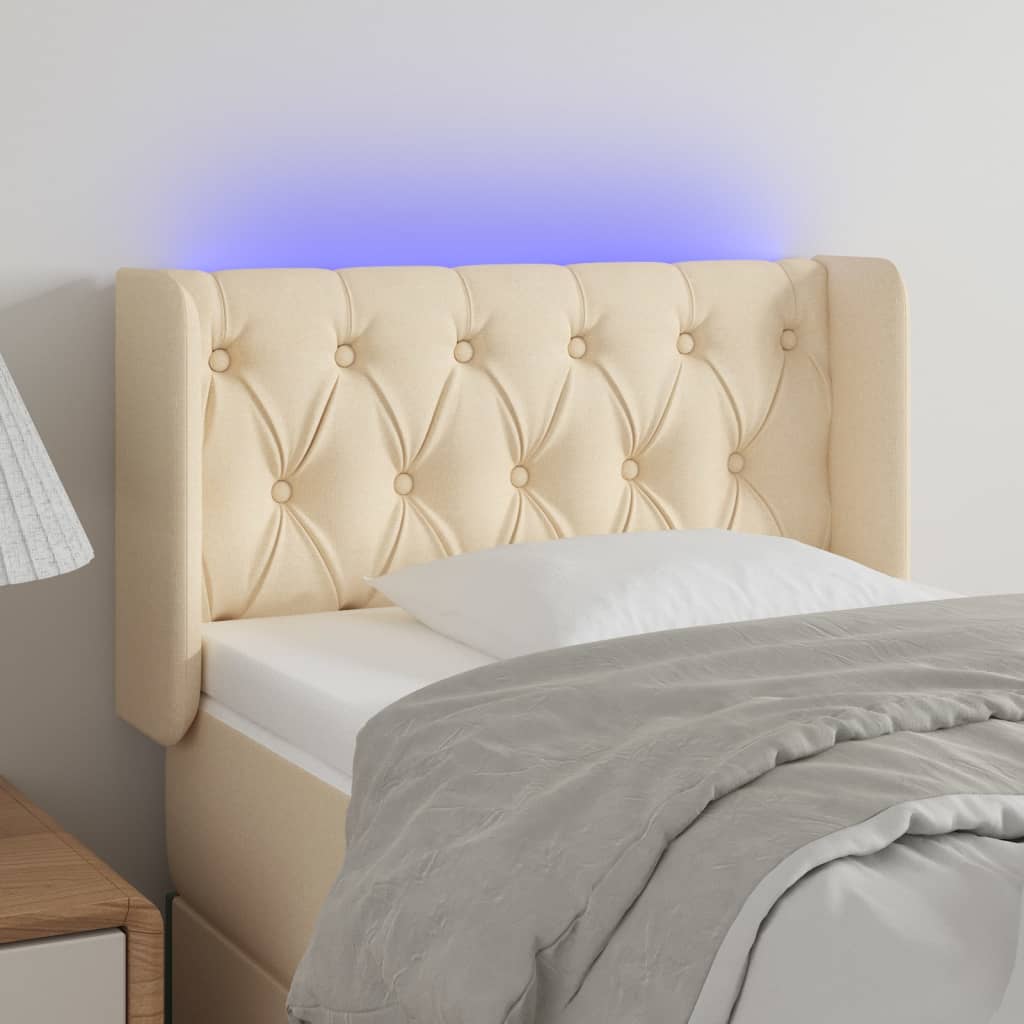 vidaXL Zagłówek do łóżka z LED, kremowy, 83x16x78/88 cm, tkanina