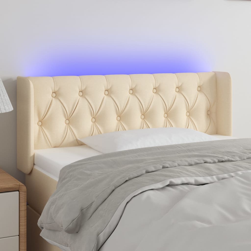 vidaXL Zagłówek do łóżka z LED, kremowy, 103x16x78/88 cm, tkanina