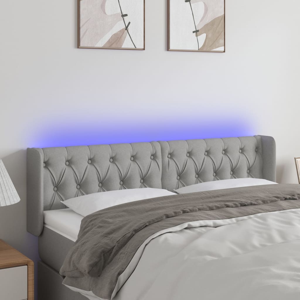 vidaXL Zagłówek do łóżka z LED, jasnoszary, 147x16x78/88 cm, tkanina