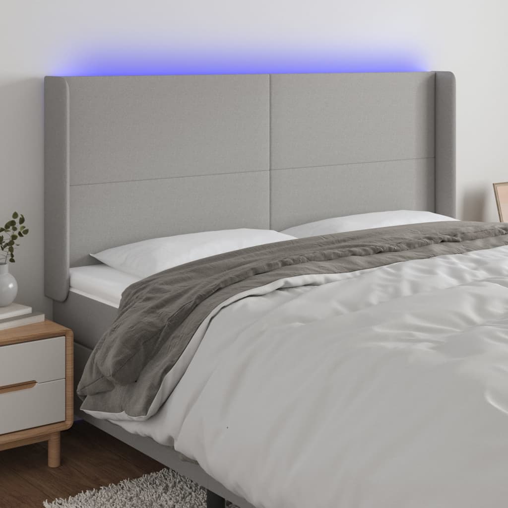 vidaXL Zagłówek do łóżka z LED, jasnoszary, 163x16x118/128 cm, tkanina