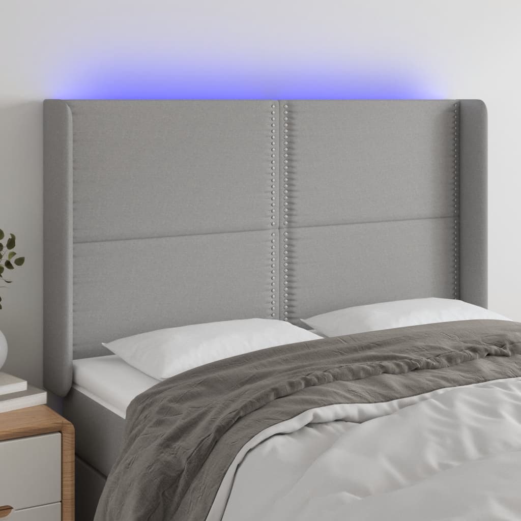 vidaXL Zagłówek do łóżka z LED, jasnoszary, 147x16x118/128 cm, tkanina