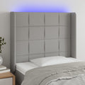 vidaXL Zagłówek do łóżka z LED, jasnoszary, 103x16x118/128 cm, tkanina