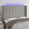 vidaXL Zagłówek do łóżka z LED, jasnoszary, 147x16x118/128 cm, tkanina