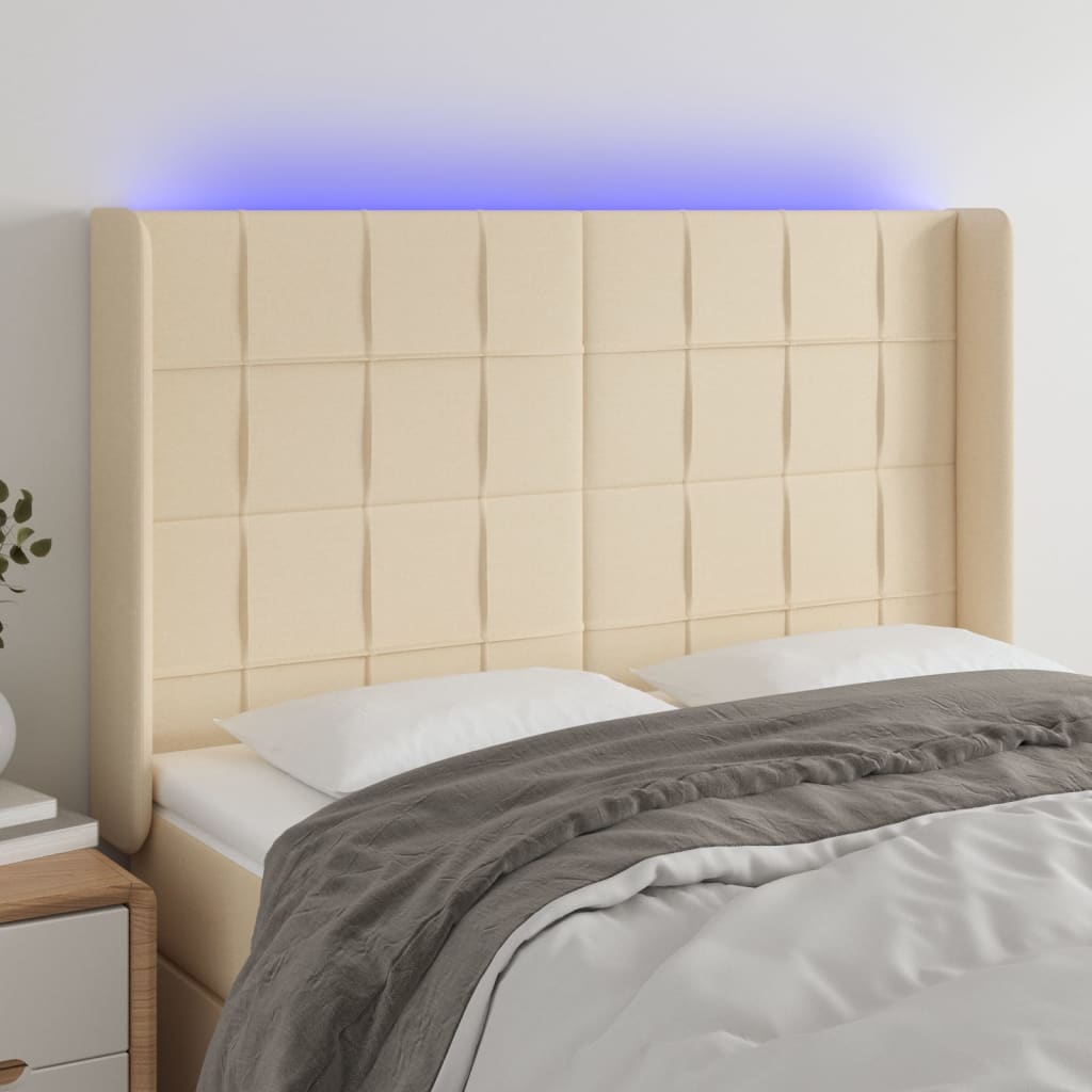 vidaXL Zagłówek do łóżka z LED, kremowy, 147x16x118/128 cm, tkanina