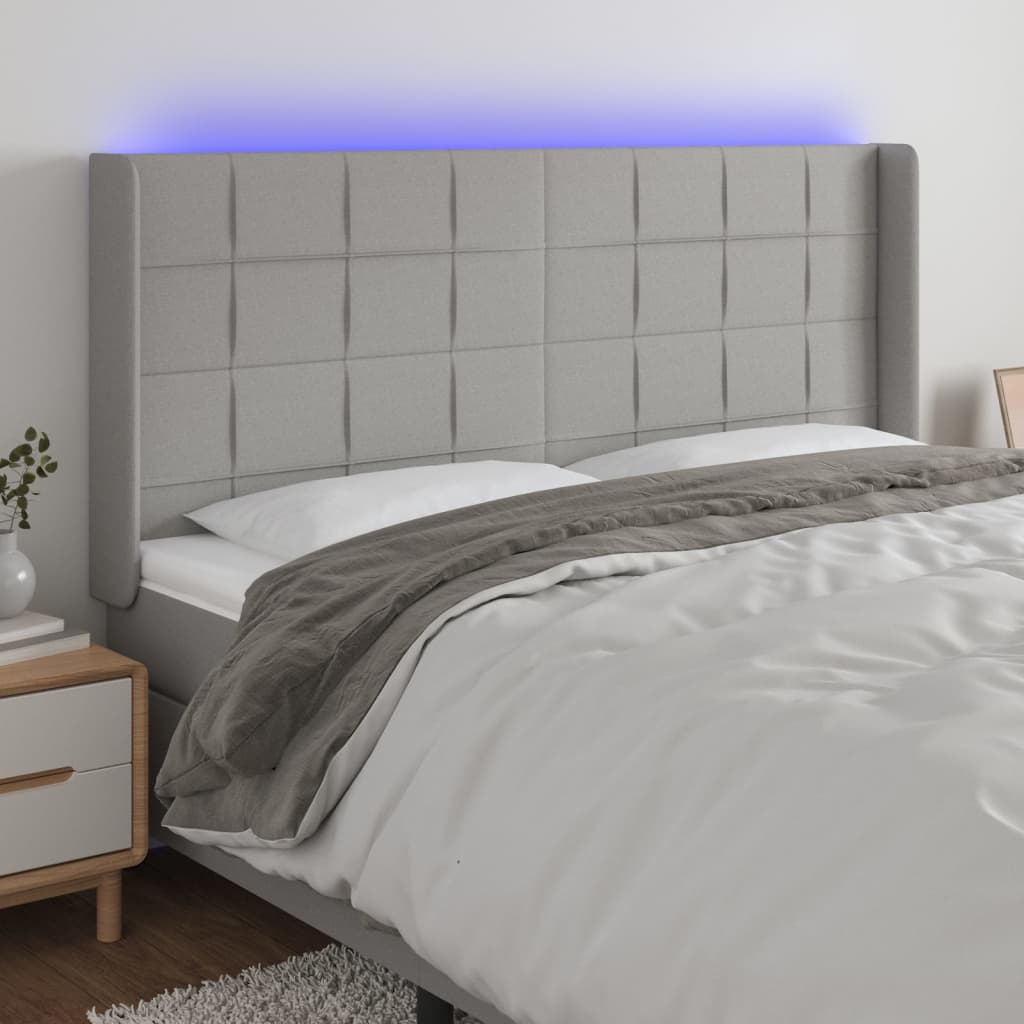 vidaXL Zagłówek do łóżka z LED, jasnoszary, 183x16x118/128 cm, tkanina