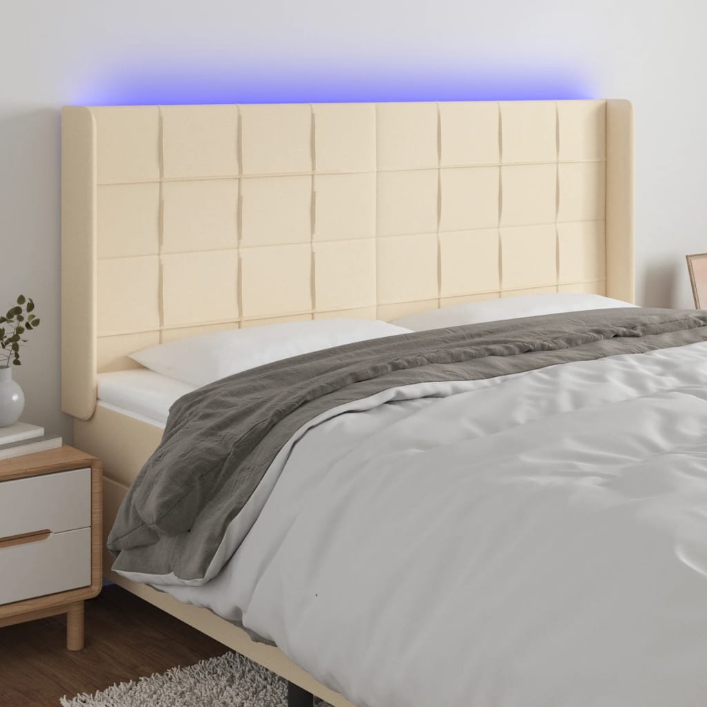 vidaXL Zagłówek do łóżka z LED, kremowy, 203x16x118/128 cm, tkanina