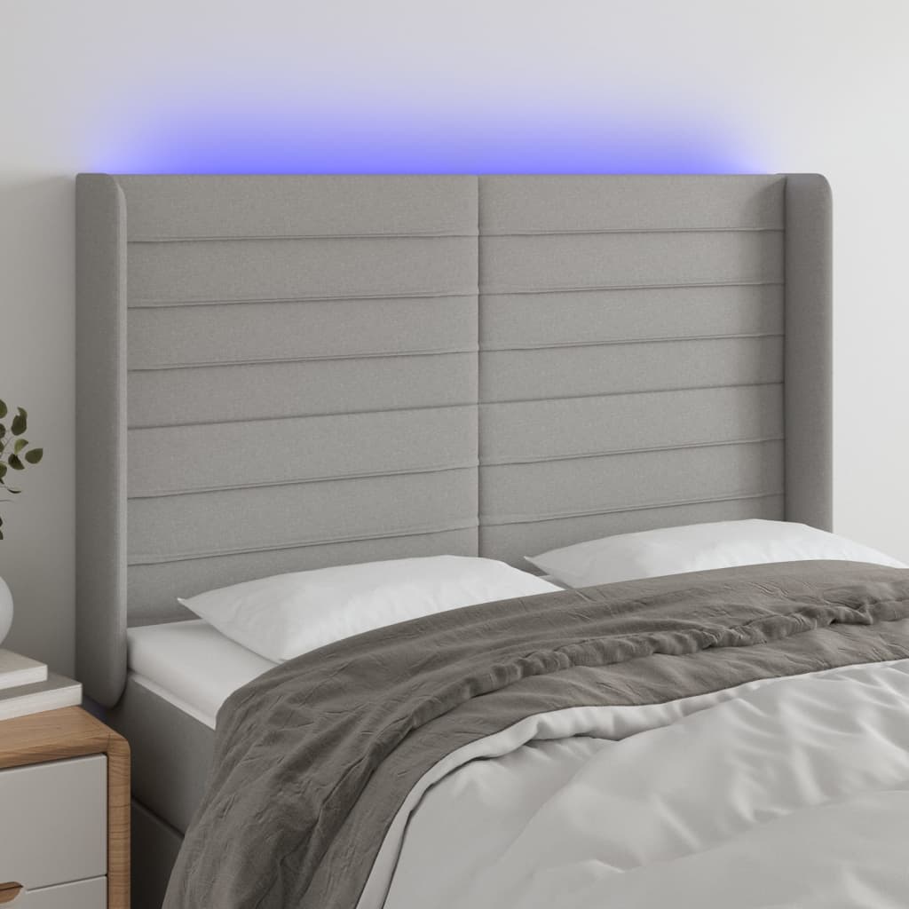 vidaXL Zagłówek do łóżka z LED, jasnoszary, 147x16x118/128 cm, tkanina