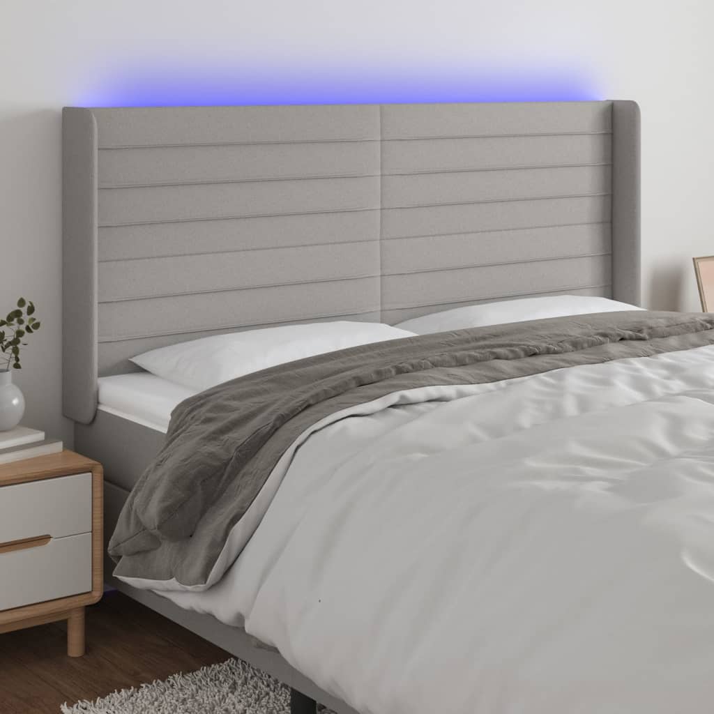 vidaXL Zagłówek do łóżka z LED, jasnoszary, 183x16x118/128 cm, tkanina