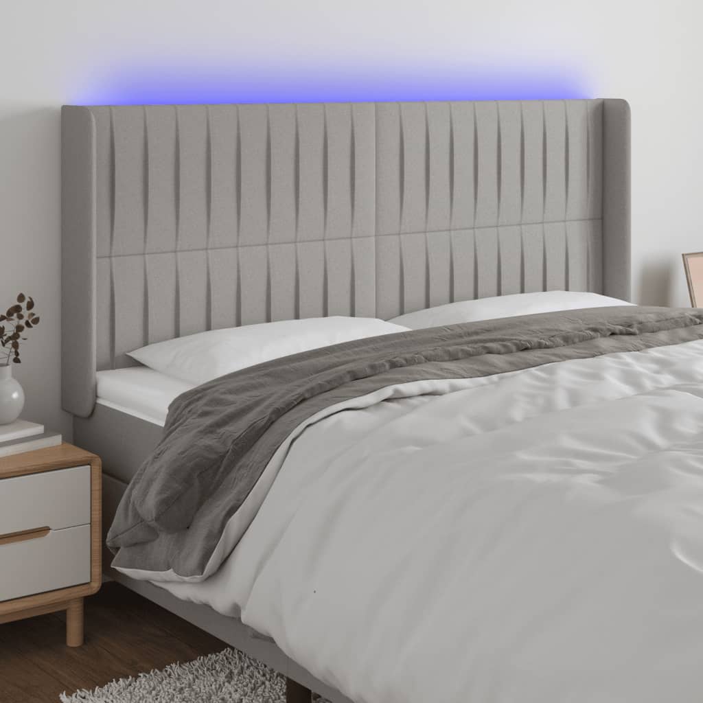 vidaXL Zagłówek do łóżka z LED, jasnoszary, 163x16x118/128 cm, tkanina
