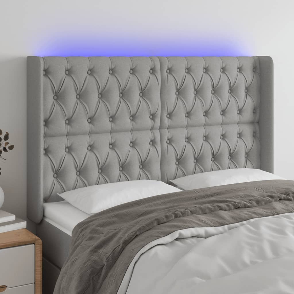 vidaXL Zagłówek do łóżka z LED, jasnoszary, 147x16x118/128 cm, tkanina