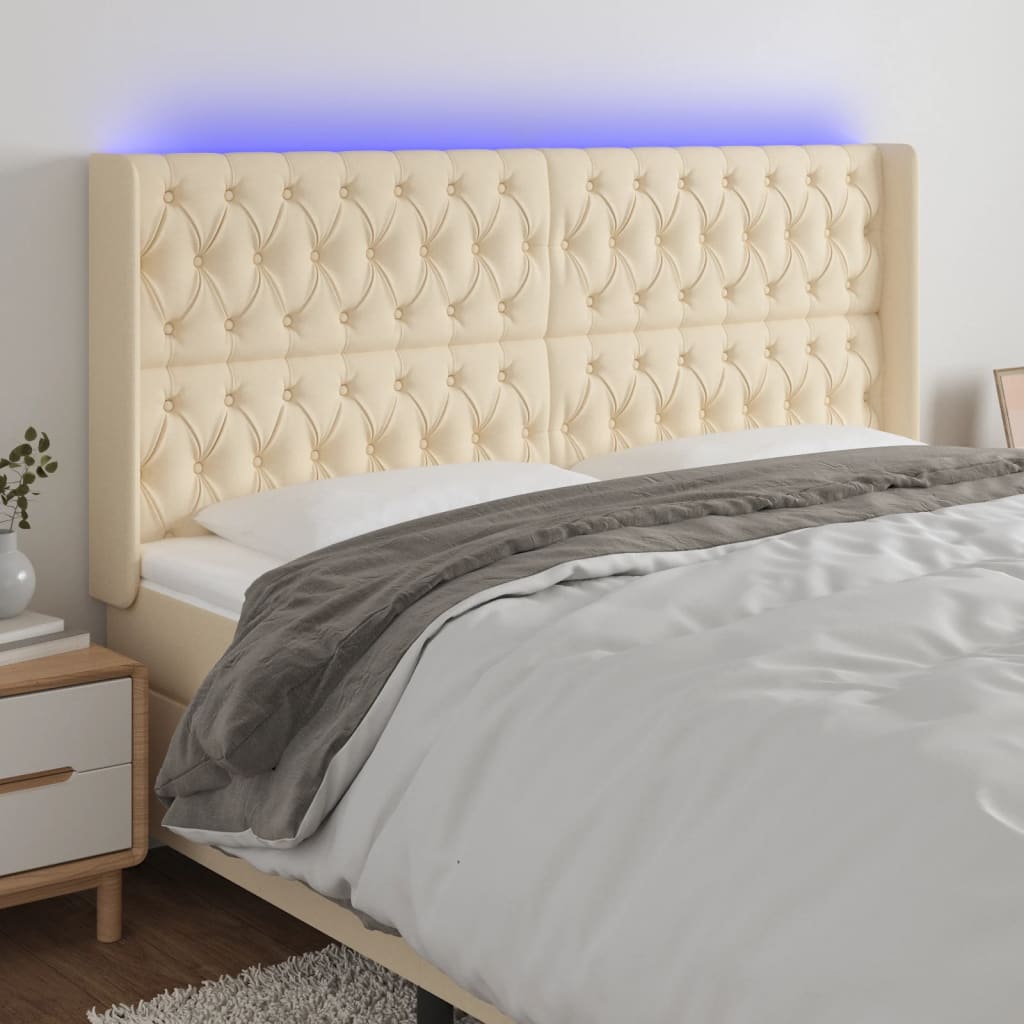 vidaXL Zagłówek do łóżka z LED, kremowy, 203x16x118/128 cm, tkanina