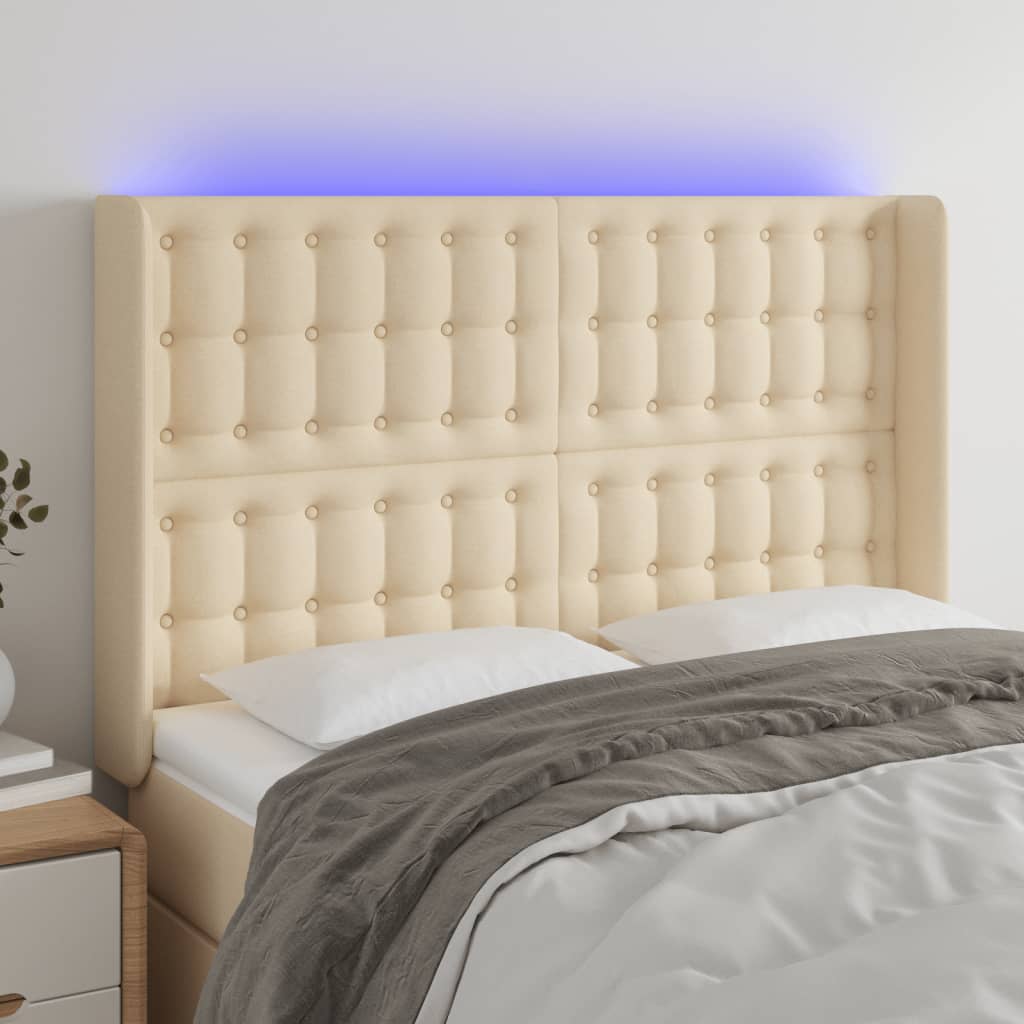 vidaXL Zagłówek do łóżka z LED, kremowy, 147x16x118/128 cm, tkanina
