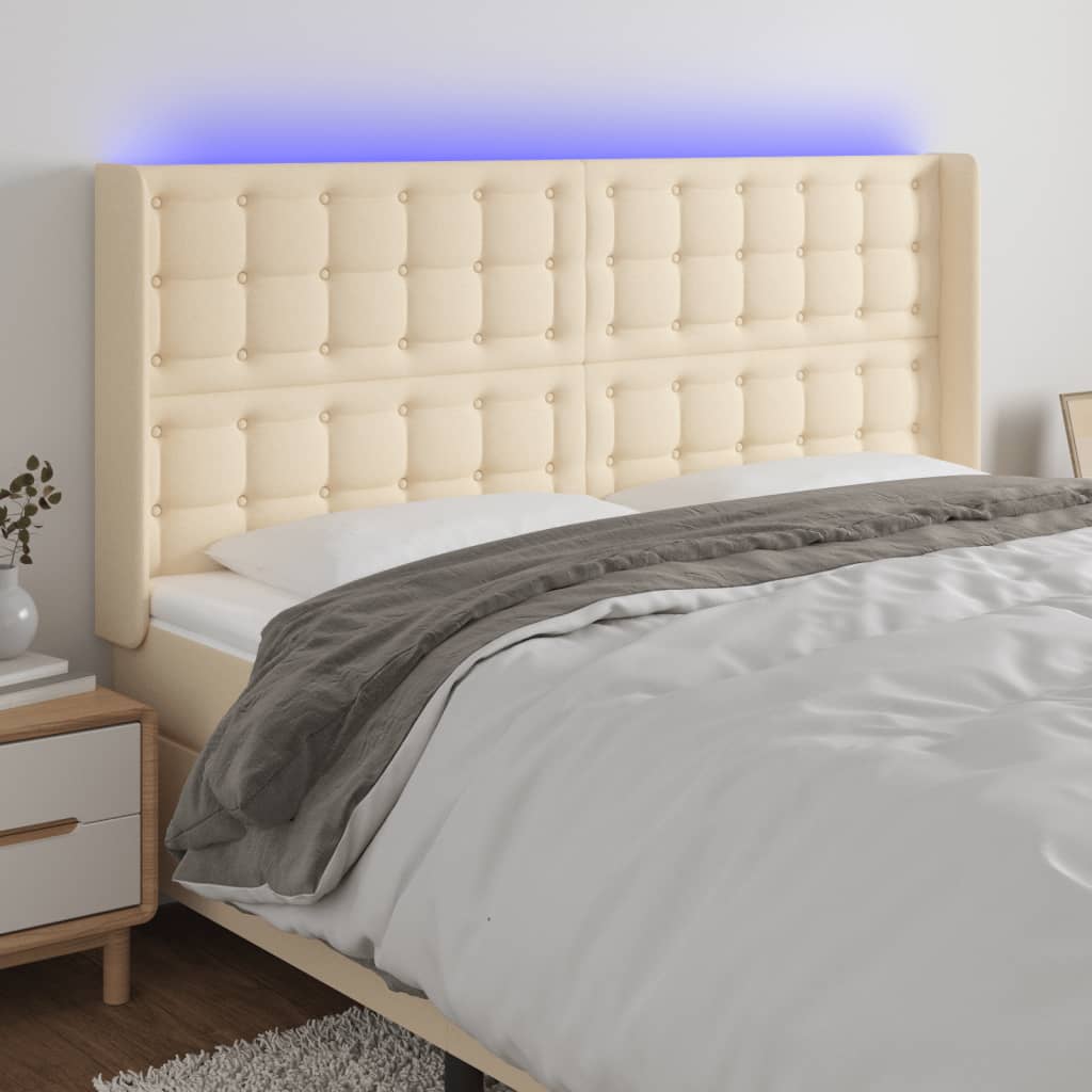 vidaXL Zagłówek do łóżka z LED, kremowy, 203x16x118/128 cm, tkanina