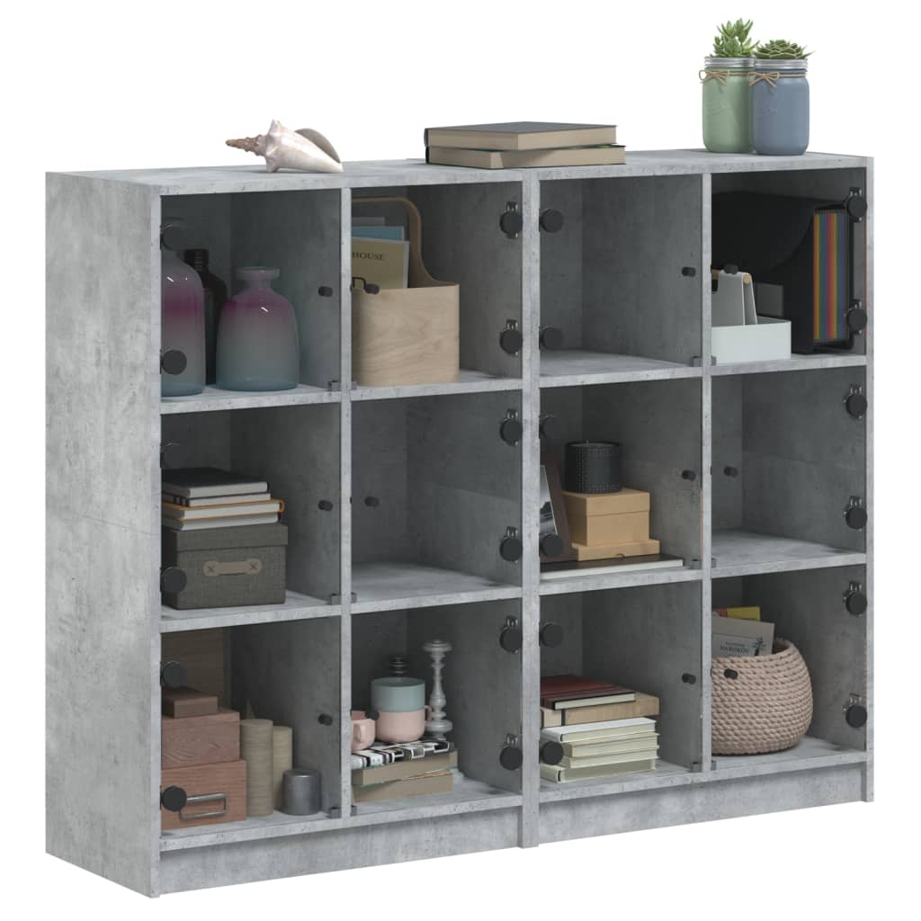vidaXL Biblioteczka z drzwiczkami, szarość betonu, 136x37x109 cm