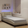 vidaXL Rama łóżka z LED bez materaca Hvar Kremowa 90x190 cm Tkanina