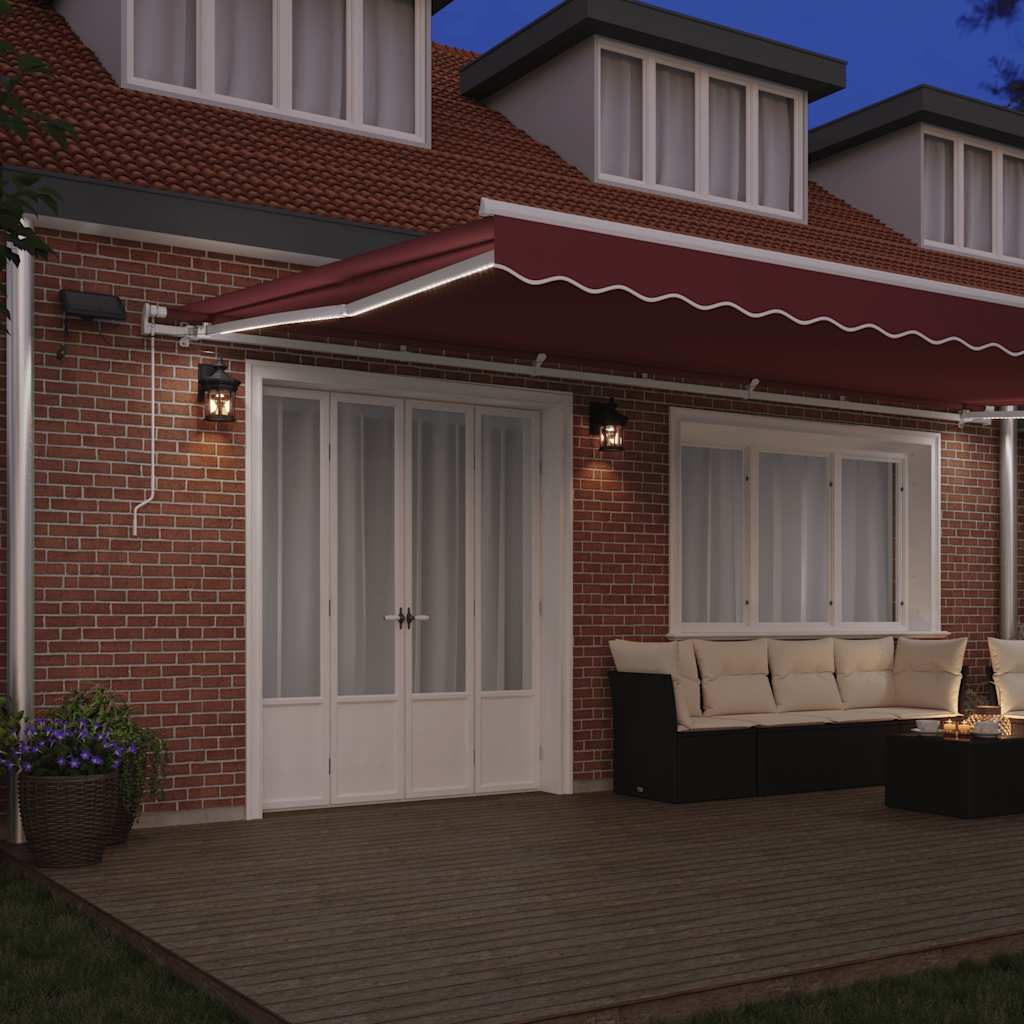 vidaXL Ręcznie zwijana markiza z LED, burgundowa, 600x300 cm