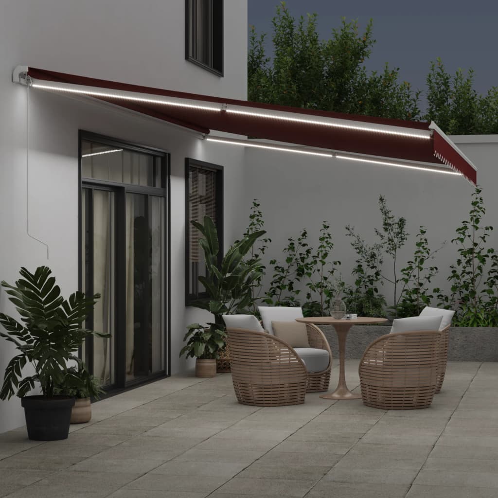 vidaXL Ręcznie zwijana markiza z LED, burgundowa, 600x350 cm
