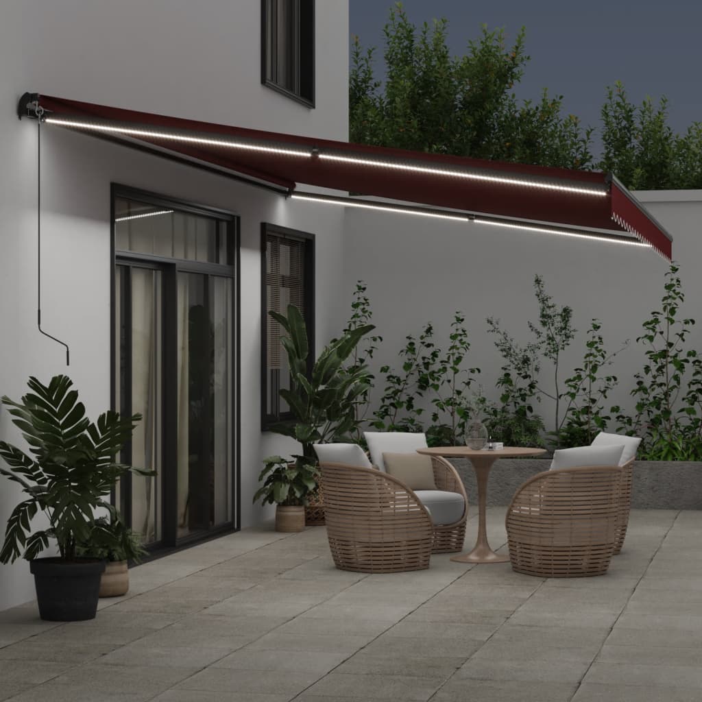 vidaXL Ręcznie zwijana markiza z LED, burgundowa, 600x350 cm