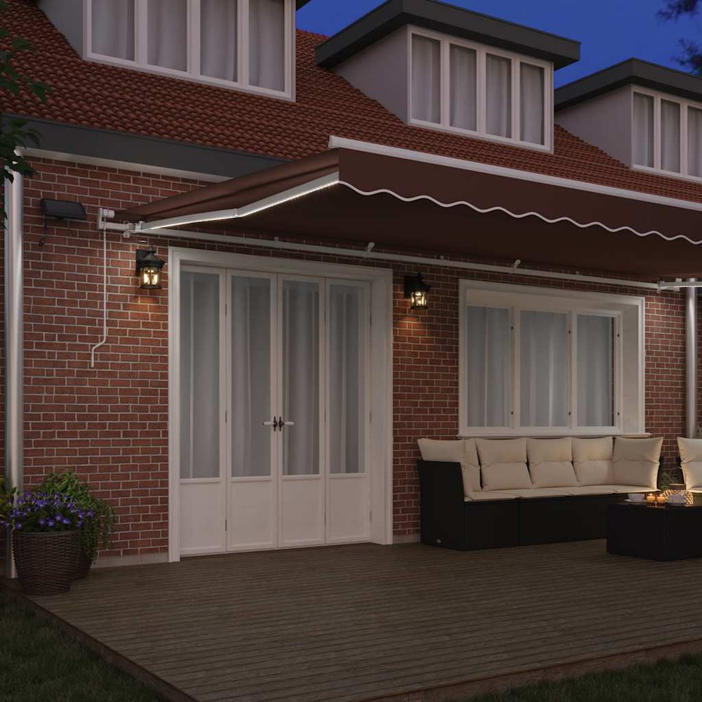 vidaXL Ręcznie zwijana markiza z LED, brązowa, 600x300 cm