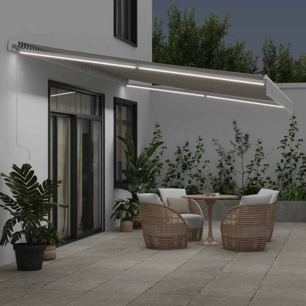 vidaXL Ręcznie zwijana markiza z LED, antracytowo-biała, 600x350 cm
