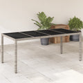 vidaXL Stół ogrodowy ze szklanym blatem, szary 190x90x75 cm, rattan PE