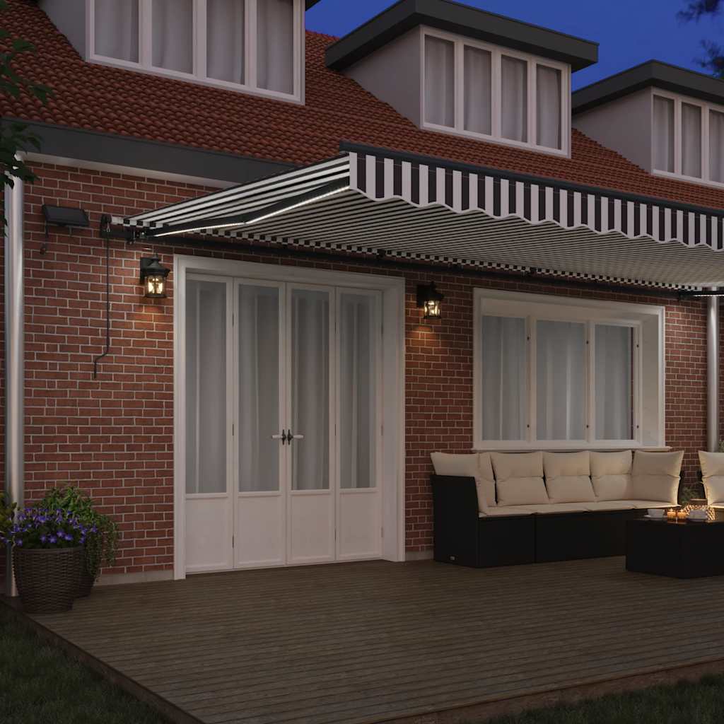 vidaXL Ręcznie zwijana markiza z LED, antracytowo-biała, 600x300 cm