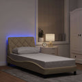 vidaXL Rama łóżka z LED bez materaca Kremowa 90x200 cm Tkanina